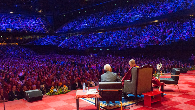 His Holiness the Dalai Lama addressing the capacity crowd of 12,000 at the Ahoy convention centre in Rotterdam, Netherlands on September 16, 2018. Photo by Jurjen Donkers
