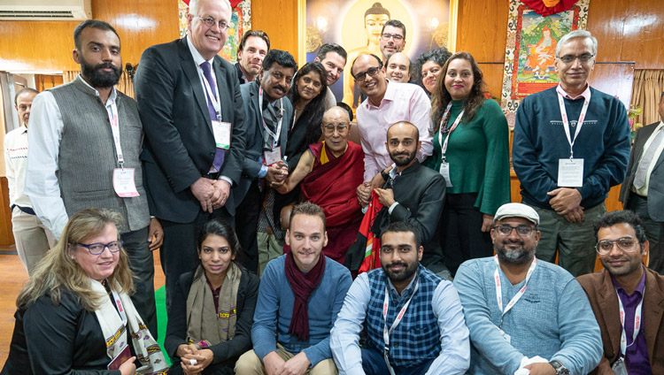 His Holiness the Dalai Lama posing for a group photo with delegates to the Rising Himachal Global Investors' Meet after their meeting at his residence in Dharamsala, HP, India on November 8, 2019. Photo by Tenzin Choejor