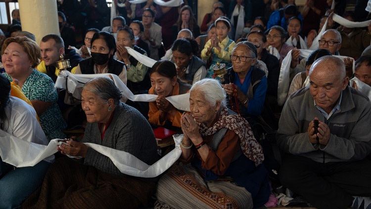 Members of the local Tibetan and Himalayan community waiting to see His Holiness the Dalai Lama as he departs after attending the Mani Dhungdrub at the Main Tibetan Temple in Dharamsala, HP, India on May 11, 2024. Photo by Tenzin Choejor