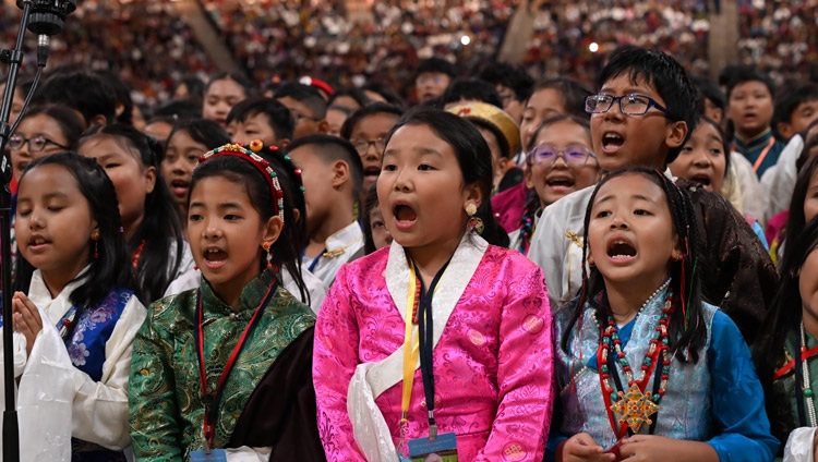 A group of 400 Tibetan children singing verses wishing His Holiness the Dalai Lama to live long during the Long Life Offering ceremony at the UBS Arena in Elmont, NY, USA on August 22, 2024. Photo by Sonam Zoksang