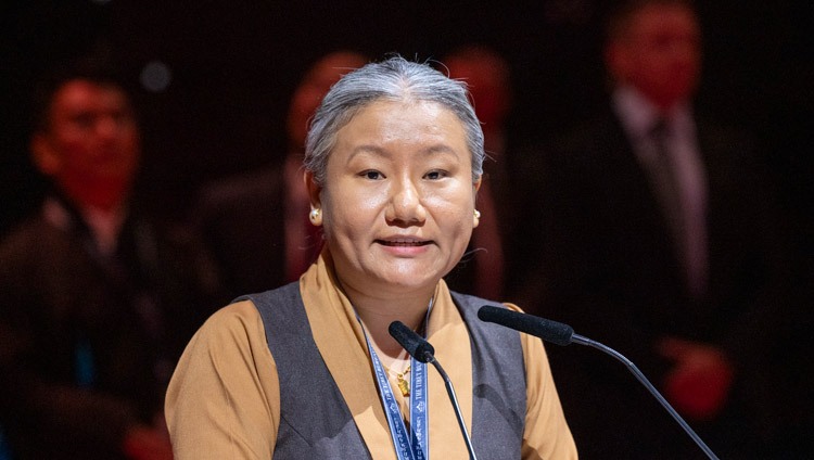 Thinley Chökyi, Representative of the Office of Tibet, Geneva, delivering her opening statement at the start of the Long Life Prayer Offering for His Holiness the Dalai Lama at the Hallenstadion in Zurich, Switzerland on August 25, 2024. Photo by Manuel Bauer