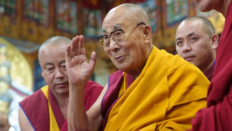 His Holiness the Dalai Lama waving to the audience as he prepares to depart at the conclusion of his teaching at the Main Tibetan Temple in Dharamsala, HP, India on September 30, 2024. Photo by Tenzin Choejor