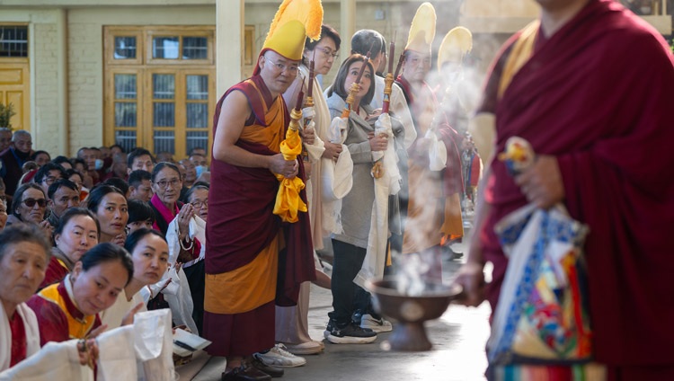 Taiwanese patrons leading the waiting to lead the way as His Holiness the Dalai Lama arrives at the Main Tibetan Temple to attend a Long Life Prayer in Dharamsala, HP, India on October 1, 2024. Photo by Tenzin Choejor