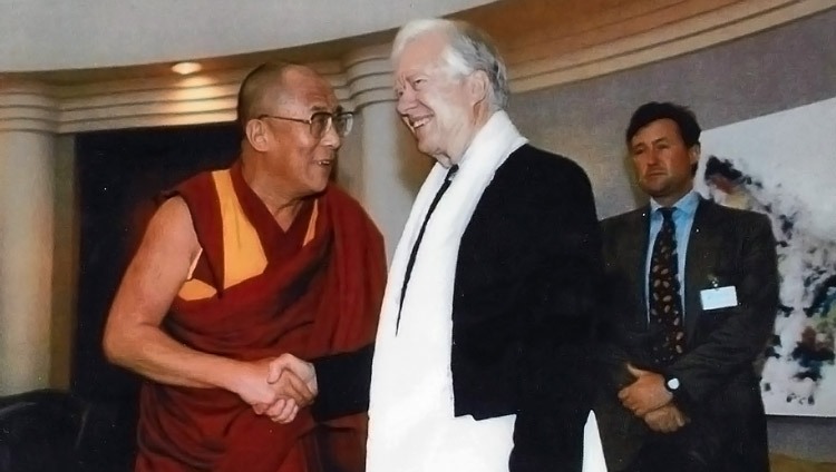 His Holiness the Dalai Lama and President Jimmy Carter together in 2002.