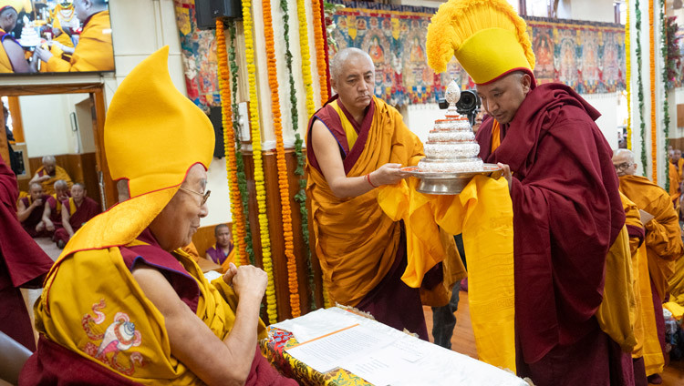 Gibong Rinpoché offered His Holiness a mandala of the universe during the Long Life Prayer offered by the people of Kinnaur at the Main Tibetan Temple in Dharamsala, HP, India on December 6, 2024. Photo by Tenzin Choejor