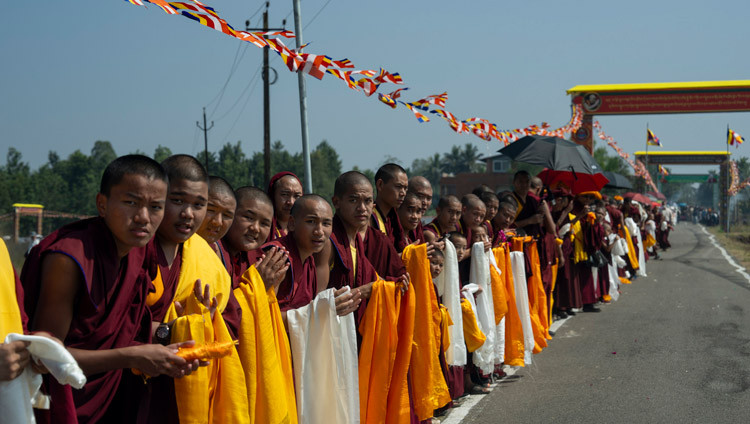 Members of the Tibetan community line the road to greet His Holiness the Dalai Lama as he makes his way to Tashi Lhunpo Monastery in Bylakuppe, Karnataka, India on January 5, 2025. Photo by Tenzin Choejor