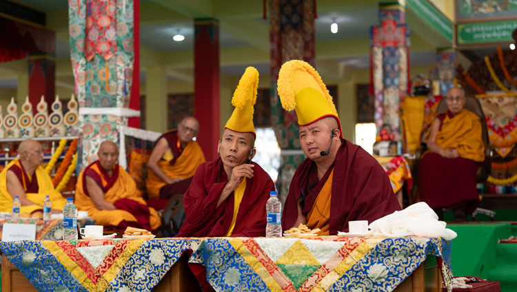 His Holiness the Dalai Lama looks on as debaters respond to challenges at the debate courtyard at Tashi Lhunpo Monastery in Bylakuppe, Karnataka, India on January 18, 2025. Photo by Tenzin Choejor