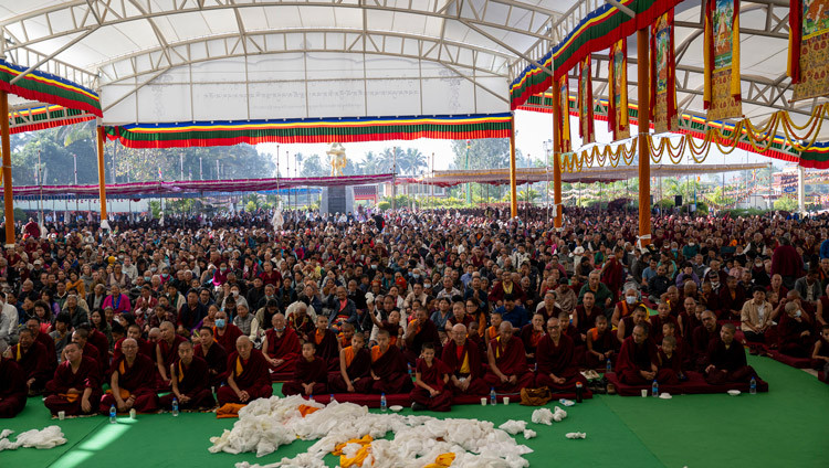 Members of the Tibetan community watching the Long Life Prayer Offering for His Holiness the Dalai Lama in the Debate Ground at Tashi Lhunpo Monastery in Bylakuppe, Karnataka, India on February 12, 2025. Photo by Ven Zamling Norbu