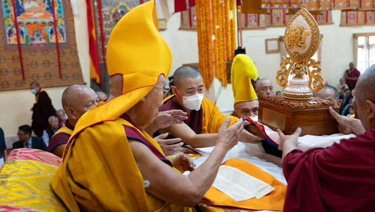 Gyudmed Tantric University presenting His Holiness the Dalai Lama with a Master of the Sutra and Tantra Tradition of Gyudmed Tantric University Award during the Long Life Prayers at Gyudmed Tantric University in Hunsur, Karnataka, India on February 17, 2025. Photo by Tenzin Choejor