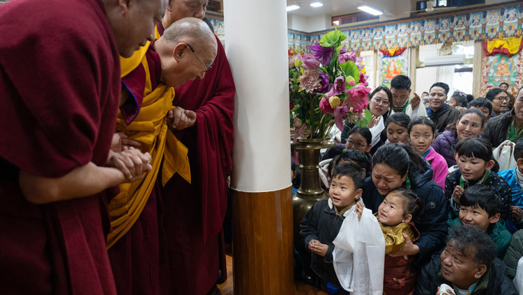 His Holiness the Dalai Lama greeting family members of the Long Life Prayer organizers as he arrives at the Old Palace at his residence in Dharamsala, HP, India on March 5, 2025. Photo by Tenzin Choejor