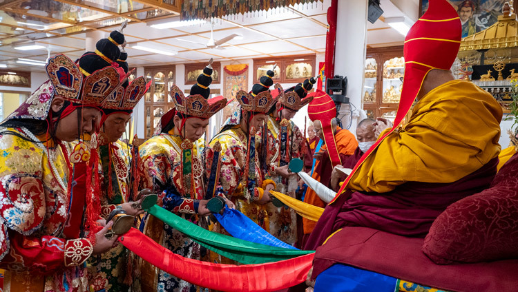 Five monks in costume representing dakinis taking part in the Long Life Prayers for His Holiness the Dalai Lama at his old residence in Dharamsala, HP, India on March 24, 2025. Photo by Ven Zamling Norbu