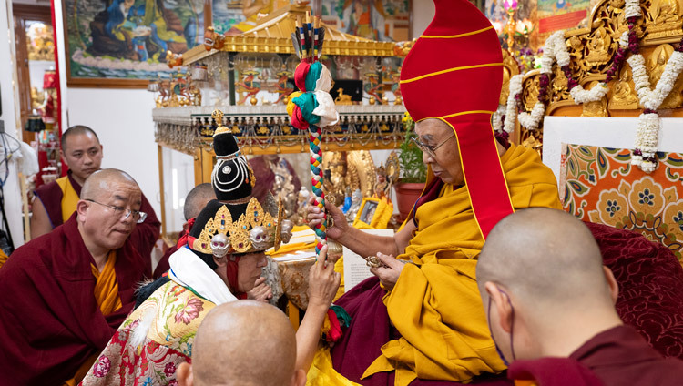 The Nechung medium in trance speaking to His Holiness the Dalai Lama during the Long Life Prayer offering at his old residence in Dharamsala, HP, India on March 24, 2025. Photo by Tenzin Choejor